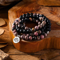 mala tibétain de lithothérapie en onyx et rhodonite