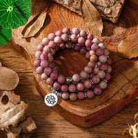 mala tibétain en pierre naturelle de rohodochrosite